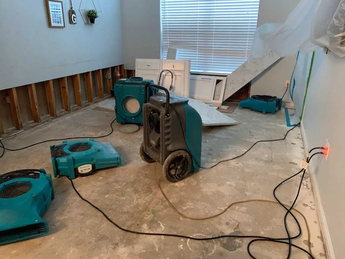 Dehumidifier in flood-cut room for Water Damage Restoration in Beacon Square